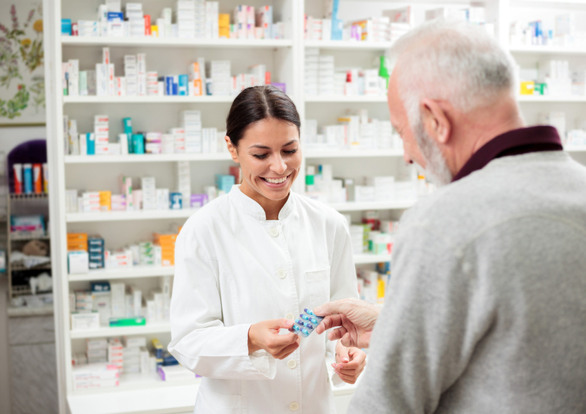 Pharmacist answers questions about new prescription.